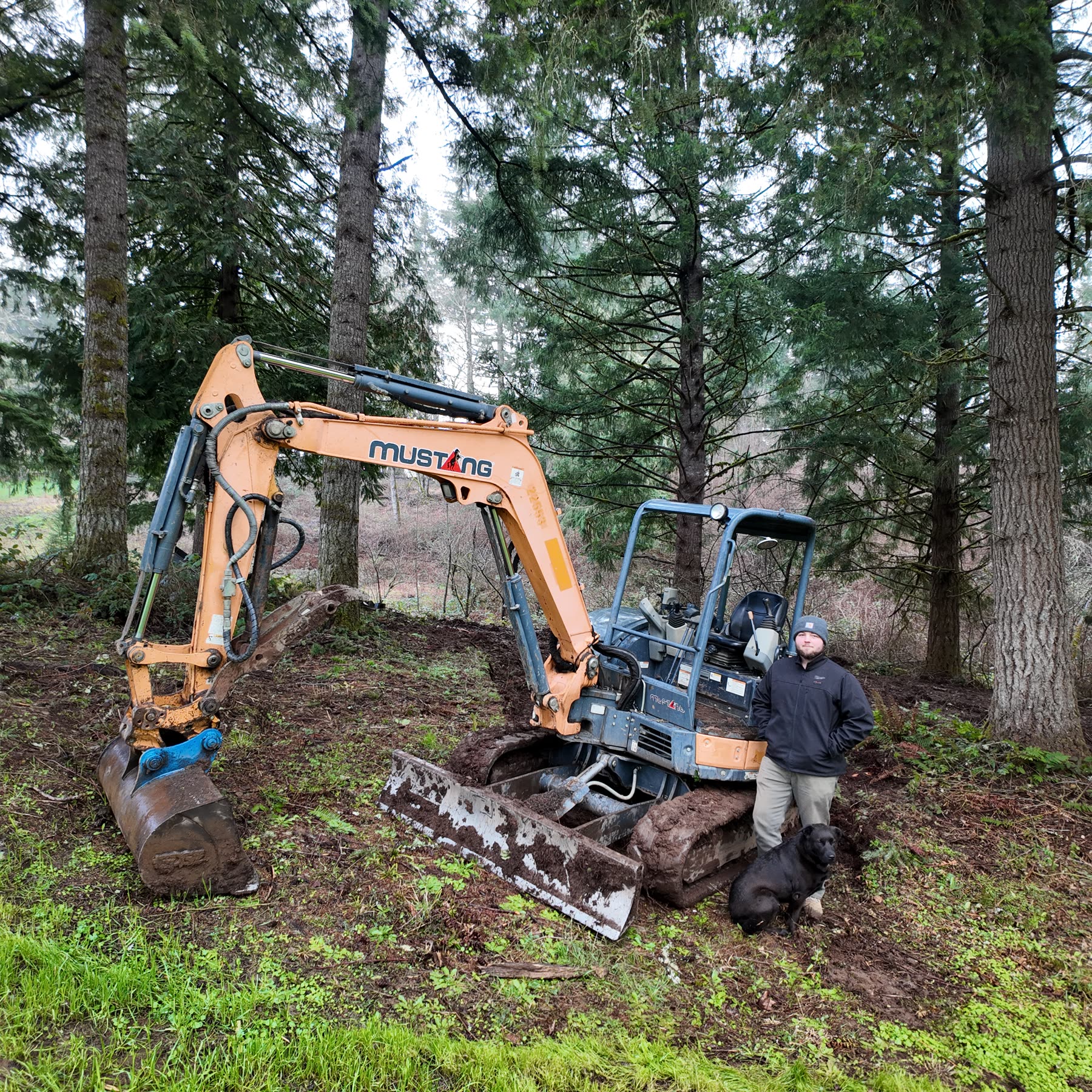 Nathan with Mustang excavator on a Damascus job site
